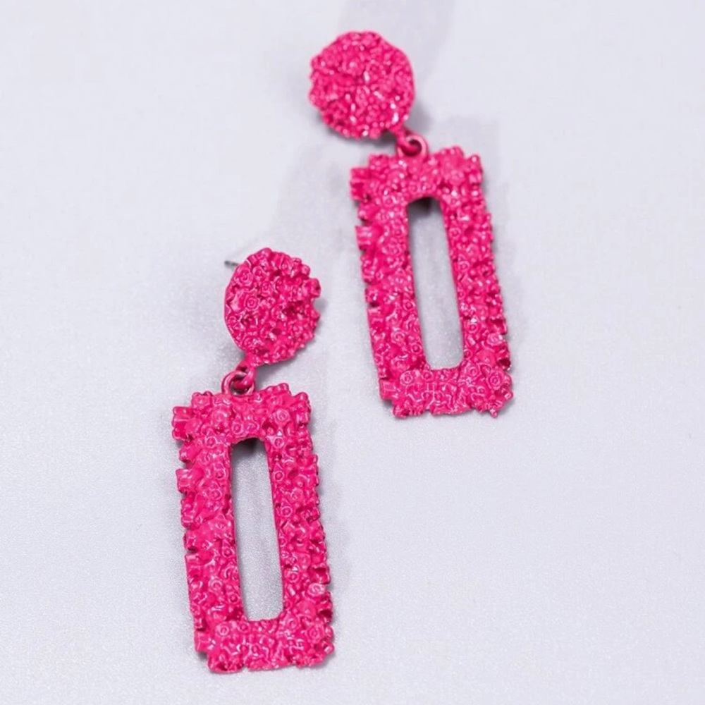 pack of pink and white earrings